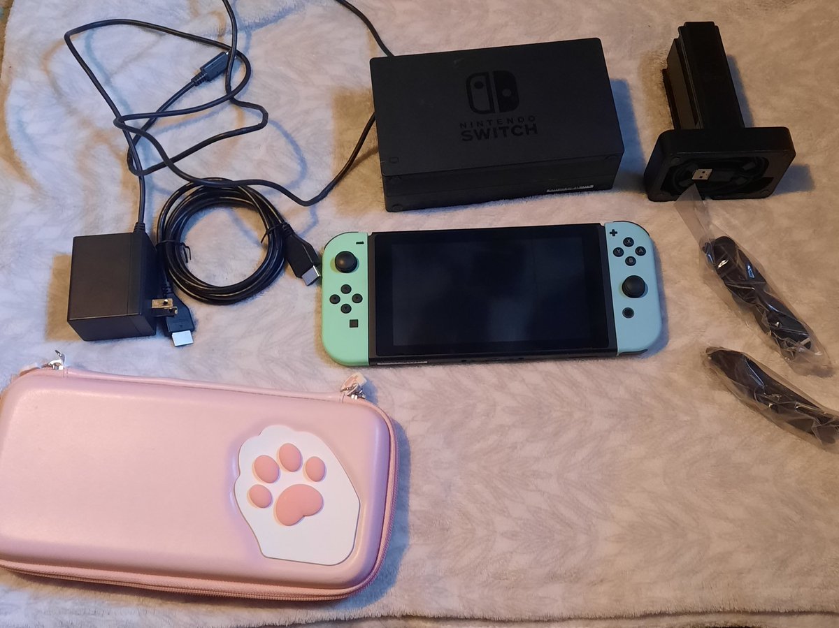 Got an Animal crossing switch bundle for sale, asking $300 shipped or best offer comes with everything pictured I'm selling it for my niece who no longer wants it she's pretty sure she didn't use the code for Bayonetta 1 https://t.co/S0MSpY6UNT