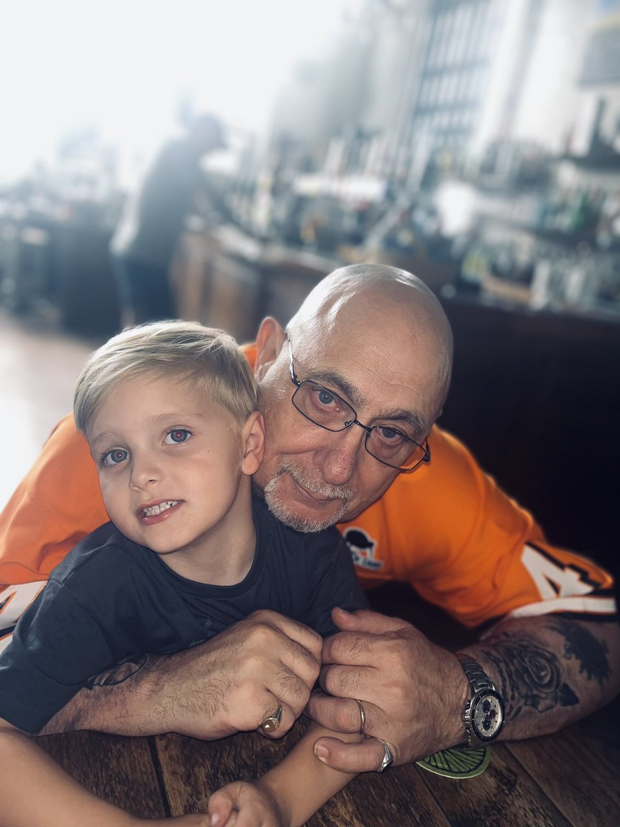 MrsSuty's tweet photo. Grampy with his @LandoNorris shirt on and our beautiful grandson who’s over the moon his @SChecoPerez ‘won’ and his Lando and his @Max33Verstappen all won! A very excited 3yr old @redbullracing @McLarenF1 #youngster #f1fan https://t.co/p5sZD6Q23B