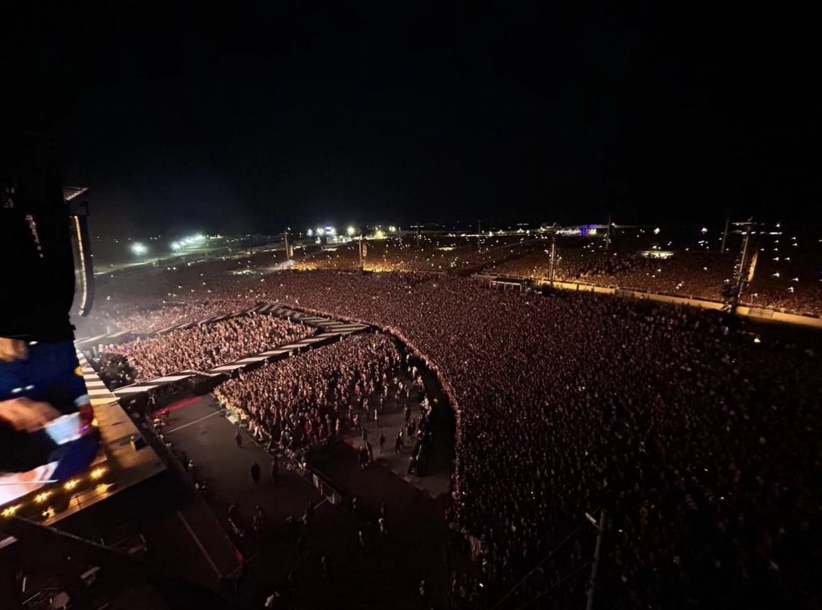 The crowd of over 100,000 people at RCF Arena Reggio Emilia in Reggio Emilia, Italy for Harry’s final show of Love On Tour - 22 July