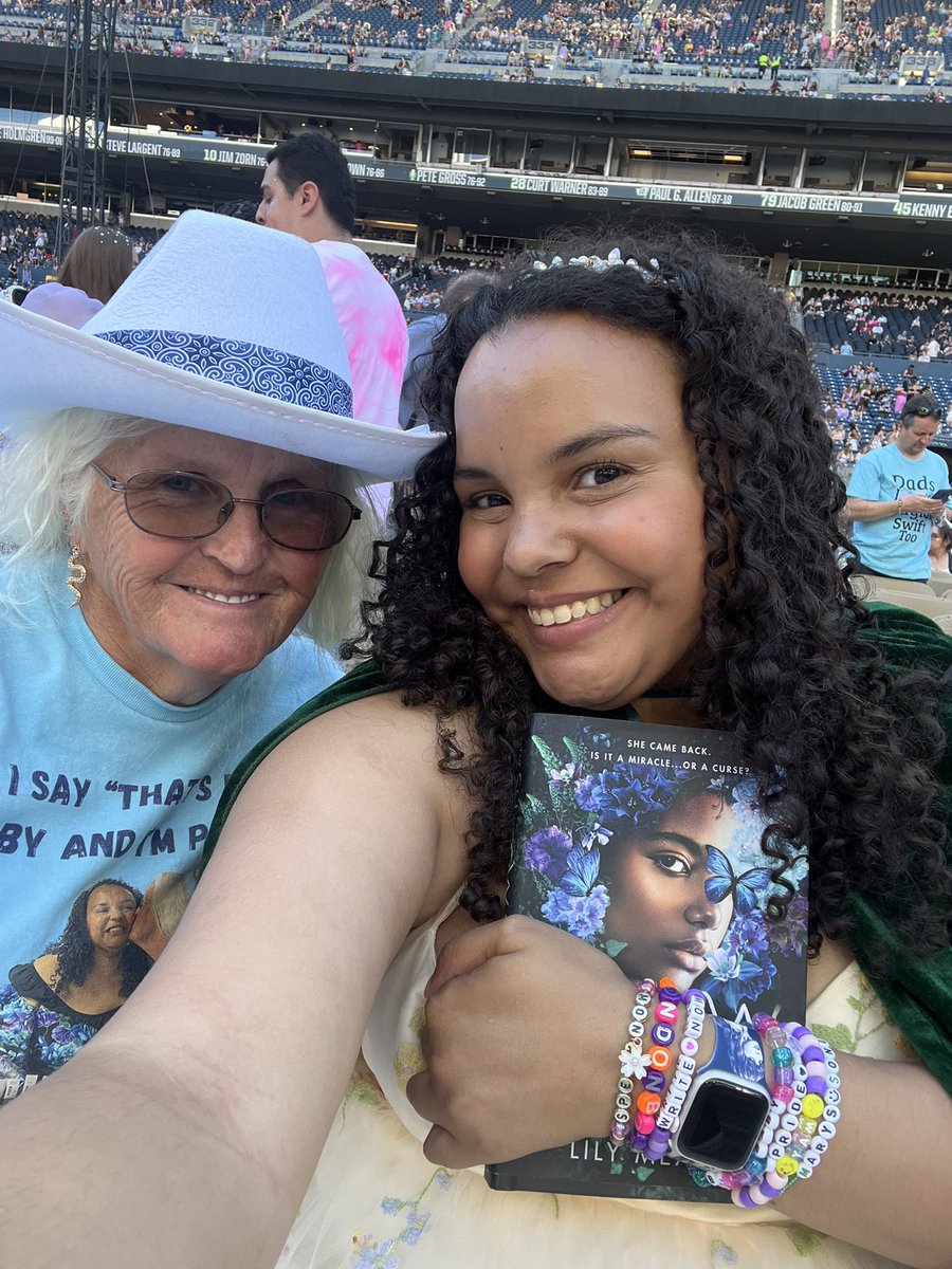 We made it! Overwhelmed with emotion to be THIS close to the stage with my mom (her first concert in 35 years!) with a copy of the book <a href="/taylorswift13/">Taylor Swift</a> made possible by helping my family in 2020. Hoping to get it to someone who can get it to Taylor tonight. #SeattleTSTheErasTour