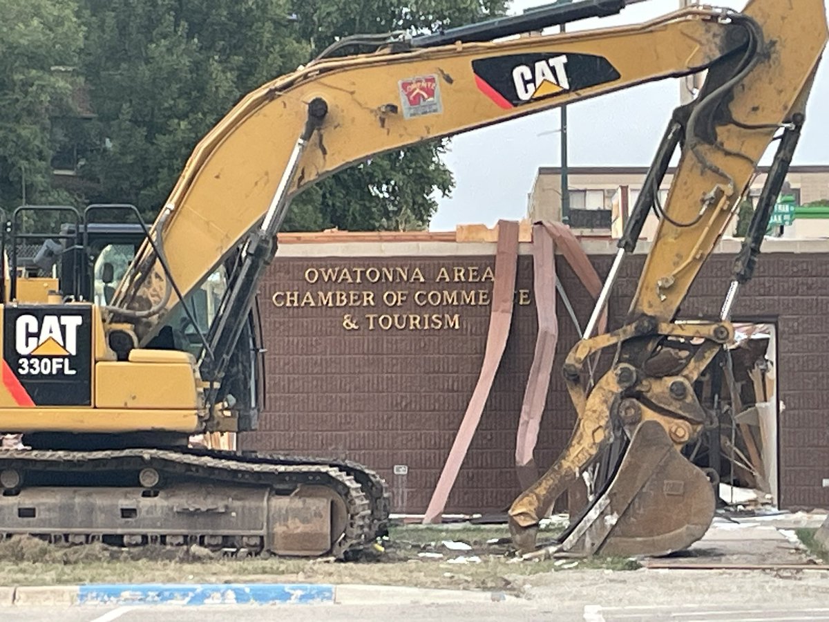 Former <a href="/OwatonnaChamber/">Owatonna Chamber</a> office is partially down.  The last building tore down to make way for the Riverfront development.
