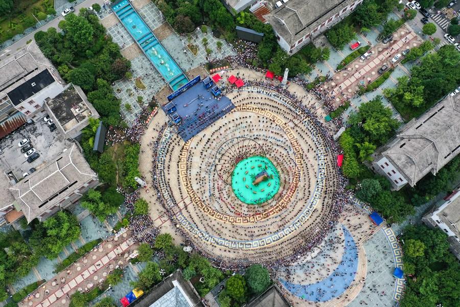 People take part in the celebration of "Liuyueliu", an ethnic festival, in Jianhe County of Qiandongnan Miao and Dong Autonomous Prefecture, southwest China's Guizhou Province, July 23, 2023. (Xinhua/Yang Wenbin)