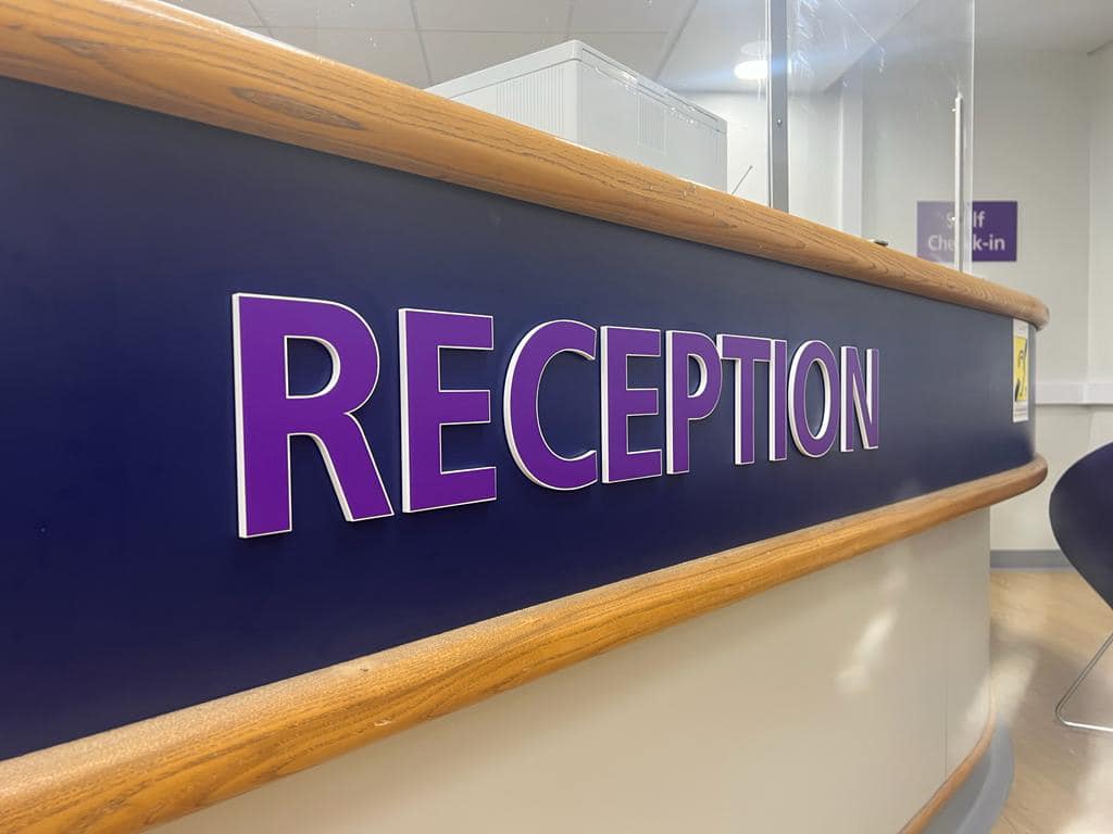 Check out this sleek receptionist sign we fitted this week! The 5mm White Acrylic provides a clean and modern look, with purple print to the face and a 2mm white outline for extra contrast.

#skelmersdale