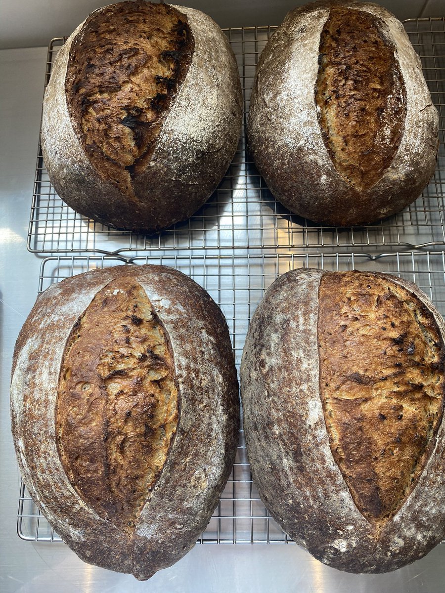Freshly baked seeded sourdough with <a href="/ampersanddairy/">Ampersand Dairy</a> butter and chicken drippings