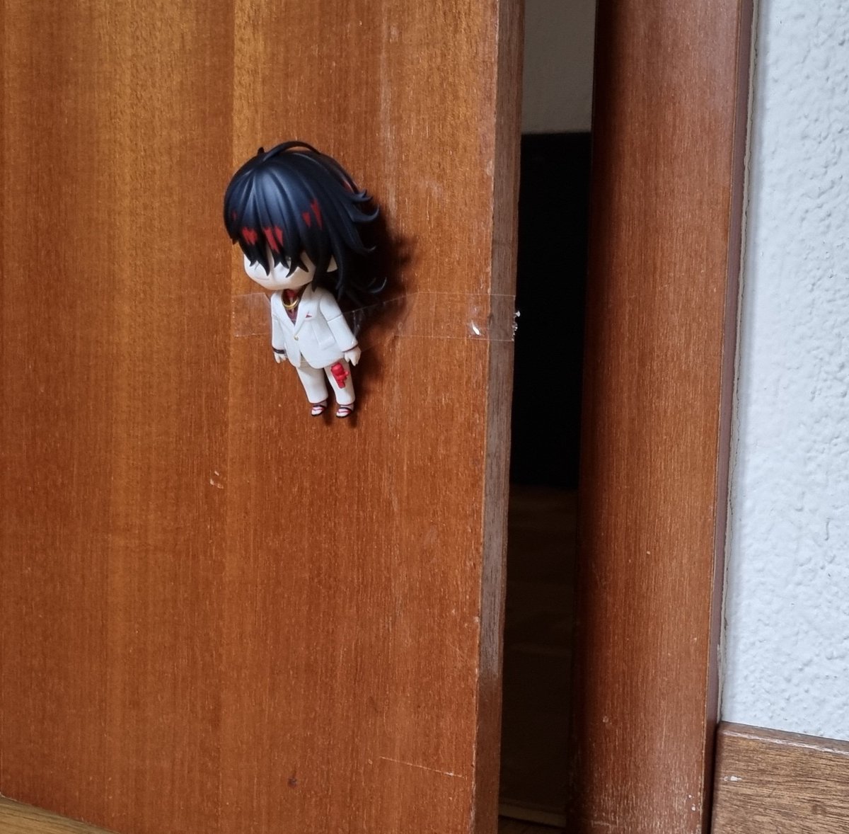 IStreamKat's tweet image. i know most people would try and do a jar joke here but it turns out i do not own one, so i figured the next best thing would be to stick him to a door that's ajar instead #VoxAkuma #AkumaMatata