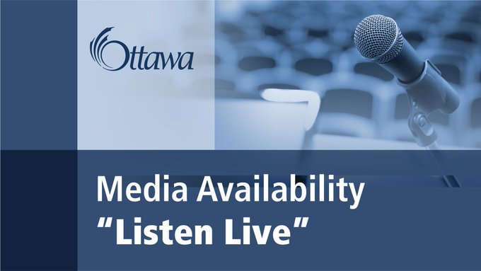 A graphic with a tinted blue background photo of a microphone and auditorium chairs. In the foreground there is a blue text box and white text that reads: Media Availability "Listen Live"