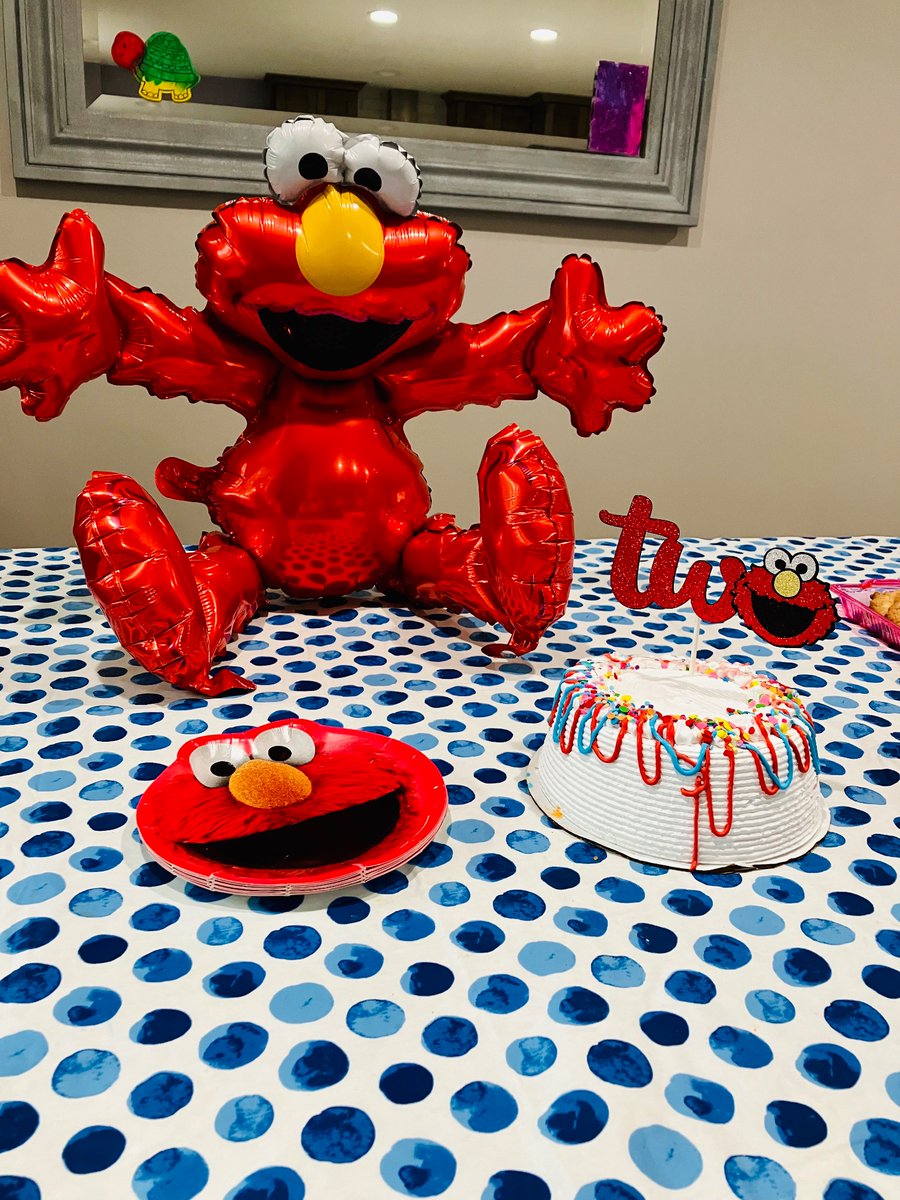 LifeandPICU's tweet photo. I’m not sure how it happened, but Squish is 2. 😱 I love watching him grow.

He and Elmo enjoyed an early celebration over the weekend with my husband’s family. 

#momademia https://t.co/DPXBOSsOKT