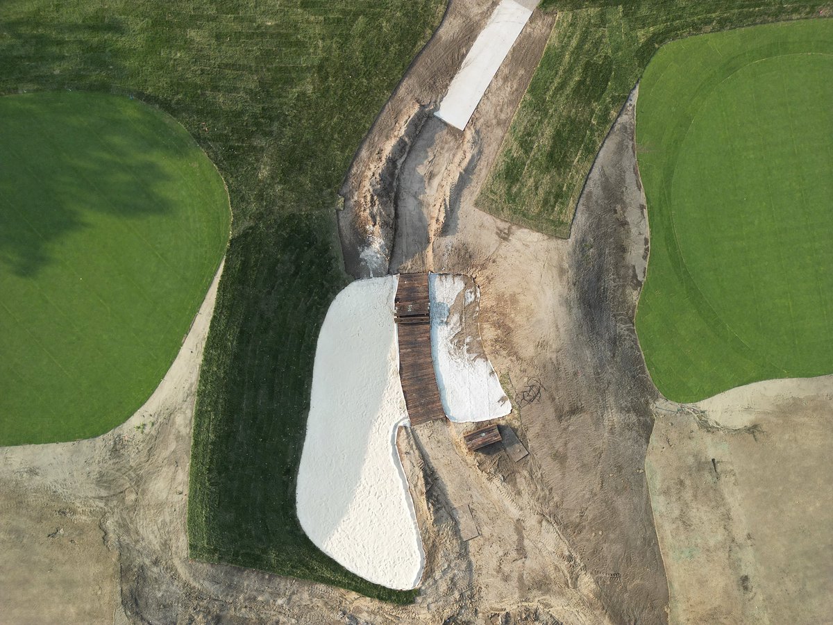Wakonda Club restoration - drive through bunker between the 1st and 4th greens. Super cool detail. Much improved par 3 2nd green complex in the background. <a href="/WakondaClub/">Wakonda Club</a> <a href="/wakondagrounds/">wakondaclubgrounds</a> <a href="/TylerRaeDesign/">Tyler Rae</a> <a href="/JimRyanGCDesign/">Jim Ryan GC Design</a>