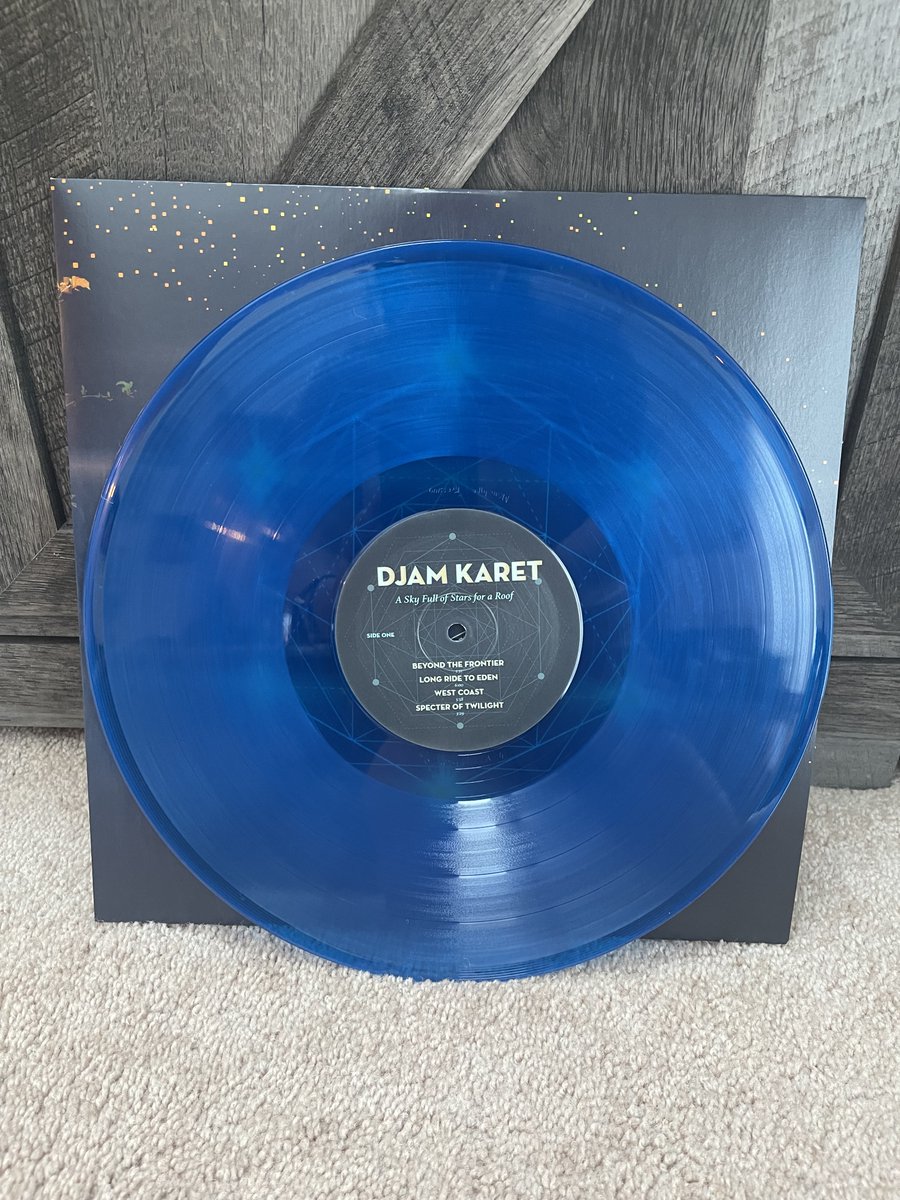 Who here loves #progrock vinyl?!  <raises hand> We've just remastered our our 2019 album, A Sky Full Of Stars For a Roof on 200-gram translucent blue vinyl! Head on over to djamkaret.bandcamp.com or http://www.djamkaret for more details! <a href="/burningshednews/">Burning Shed</a> <a href="/rhinoclaremont/">Rhino Claremont</a>