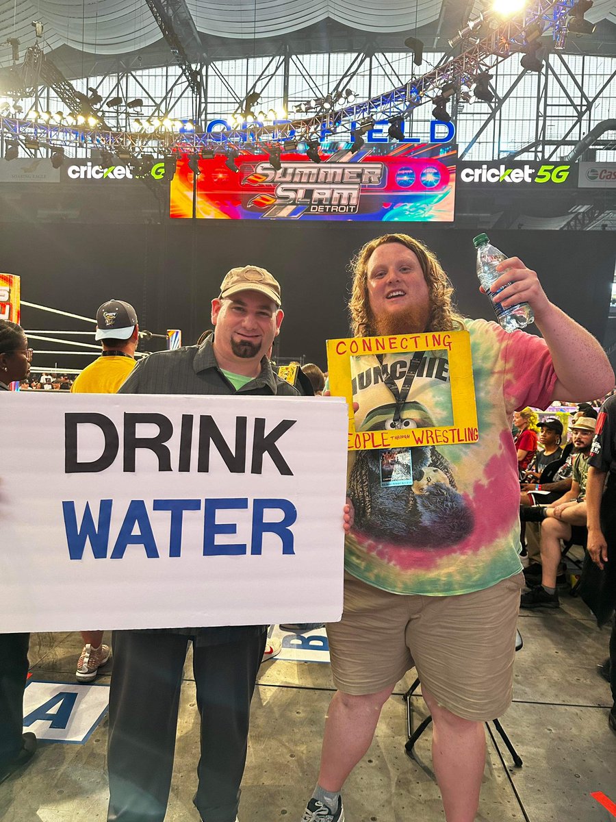 Wrestle_Connect's tweet photo. Collared shirt guy with @MHshow21 + Cole Wilder (he’s on YouTube) 

I’m a big fan of both messages here.  

#summerslam #wwe #drinkwater #water https://t.co/Ml1wA33kXd