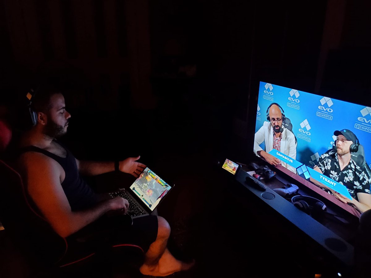 Raystacksem's tweet image. Me watching @EVO right now. My wife walked in, laughed hysterically and called me a nerd 😂😂😂@ernestolopezjr #FGC #EVO2023 #UMVC3 #SFVI #DBZF