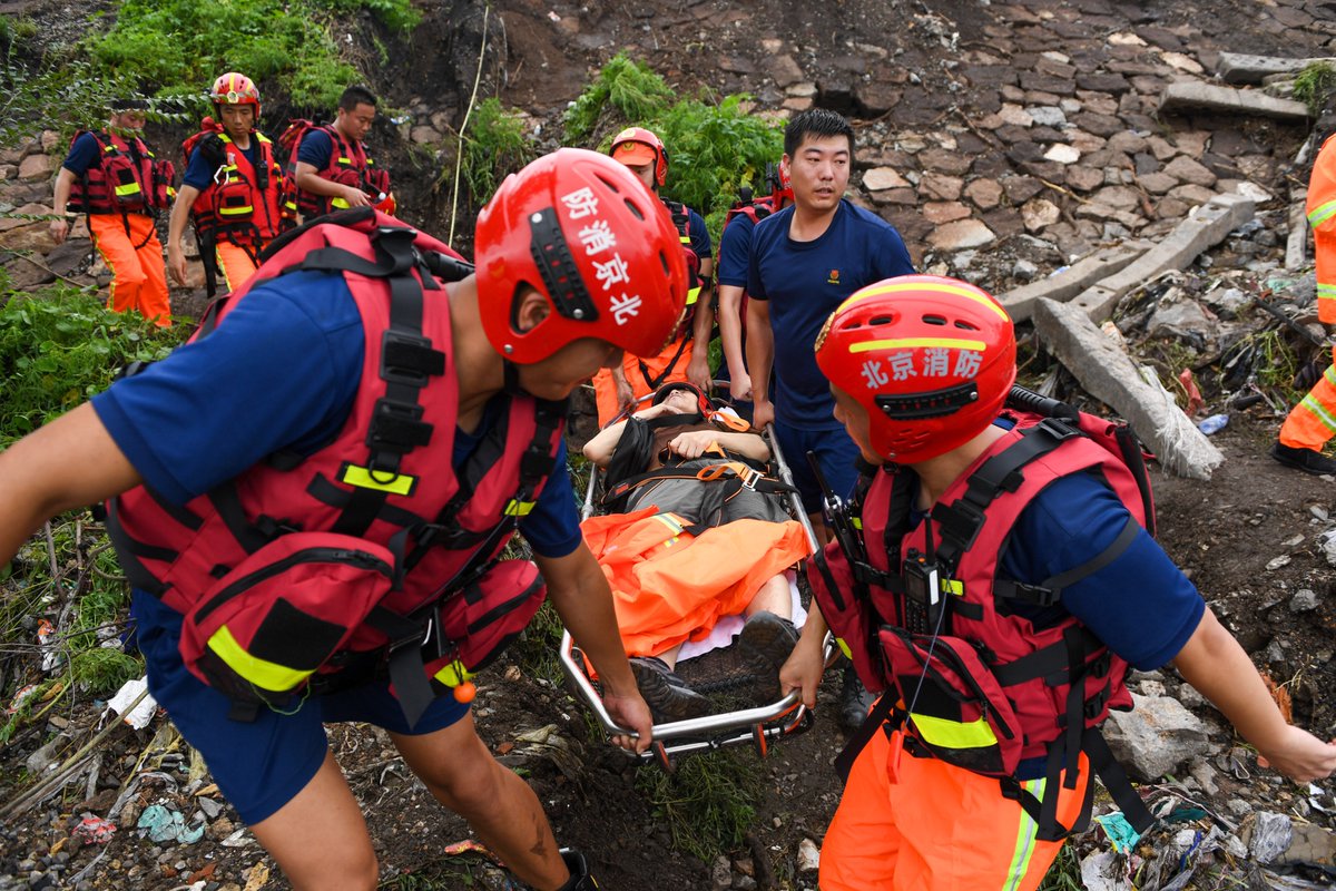 SpokespersonCHN's tweet photo. All-out rescue &amp; relief efforts in response to the typhoon-induced torrential rains that hit North China. Salute to the heroes who have put themselves in harm's way to save others! Standing firm and in unity, we'll prevail over &amp; rebuild better. https://t.co/V3Fl8nDCdj