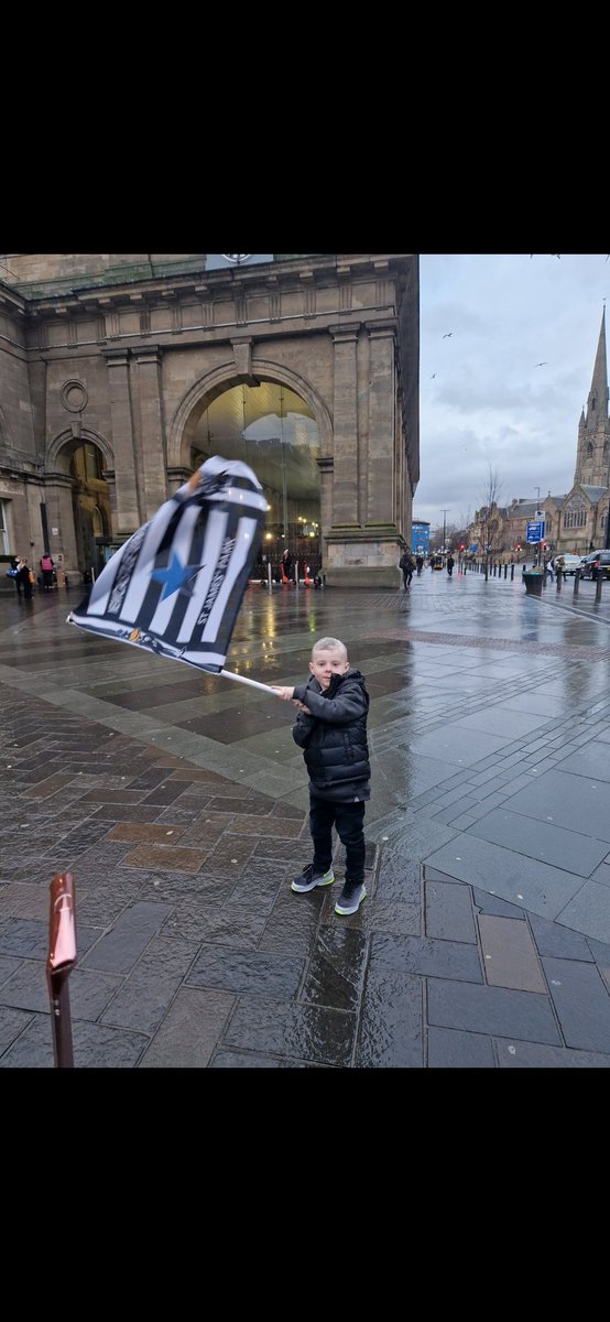 tobin_cheryl's tweet photo. @cartersnufc @worflags He likes to proudly wave it on the way to and from. This flag came to Wembley with us, he will be waving it as he always does on the way to St James on Saturday 🖤🤍 https://t.co/eh3HrgrNOi