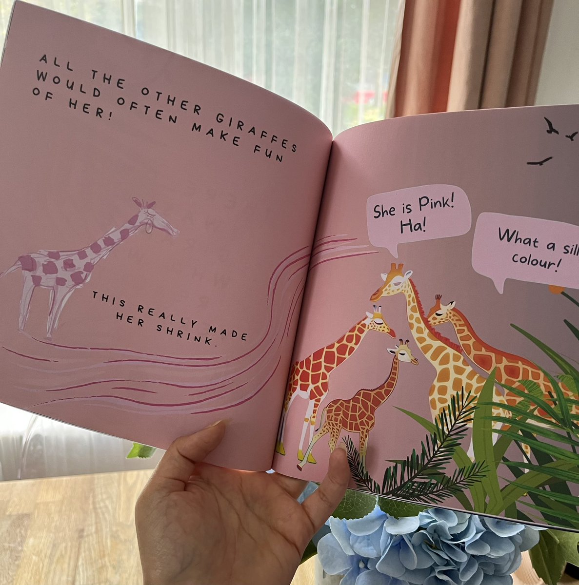 Feels very strange to have a book I wrote in my hands. Very surreal, but here it is, The Very Pink Giraffe!