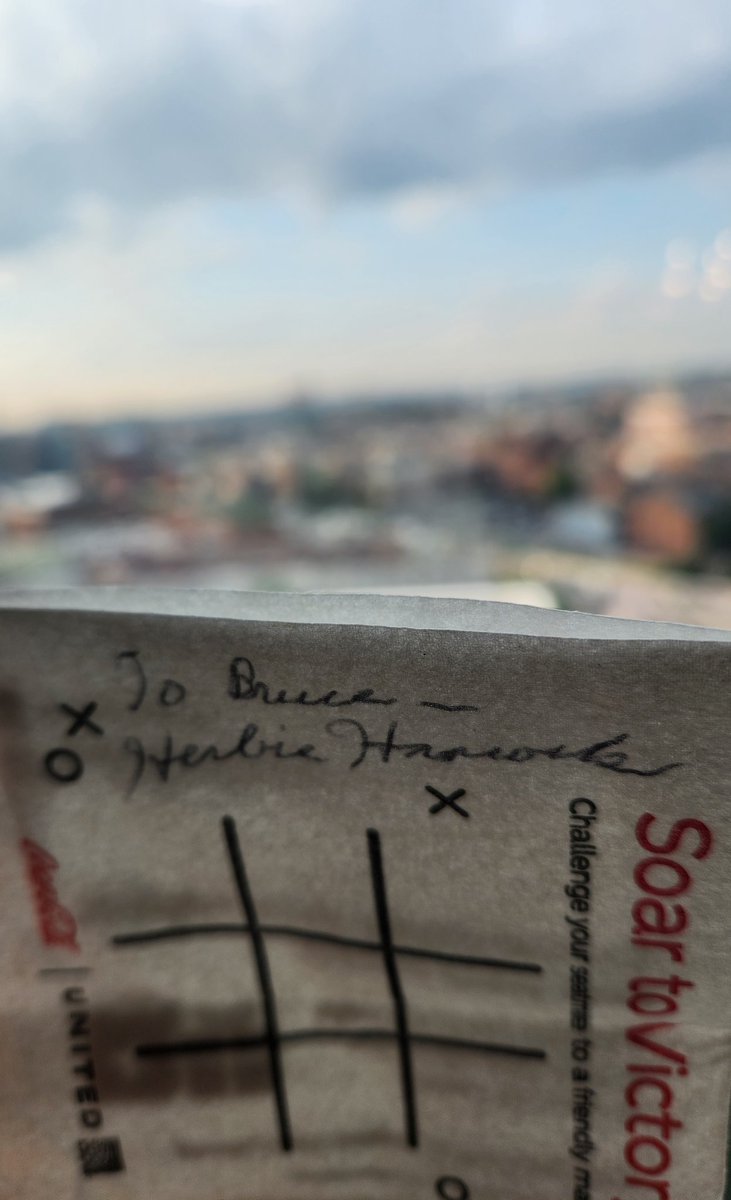 thejgrigs's tweet photo. Sat next to @herbiehancock on today's flight. He signed this for my dad, who's a big fan! https://t.co/DvDufAKHyn