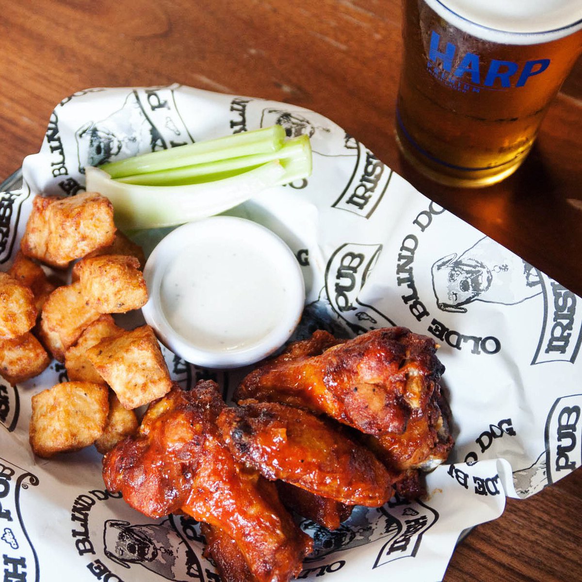 It’s a great day for an afternoon at the pub with beer, Flying Chicken Wings, and homemade Tater Tots. #wings #bestwings #beer #pub #irishpub