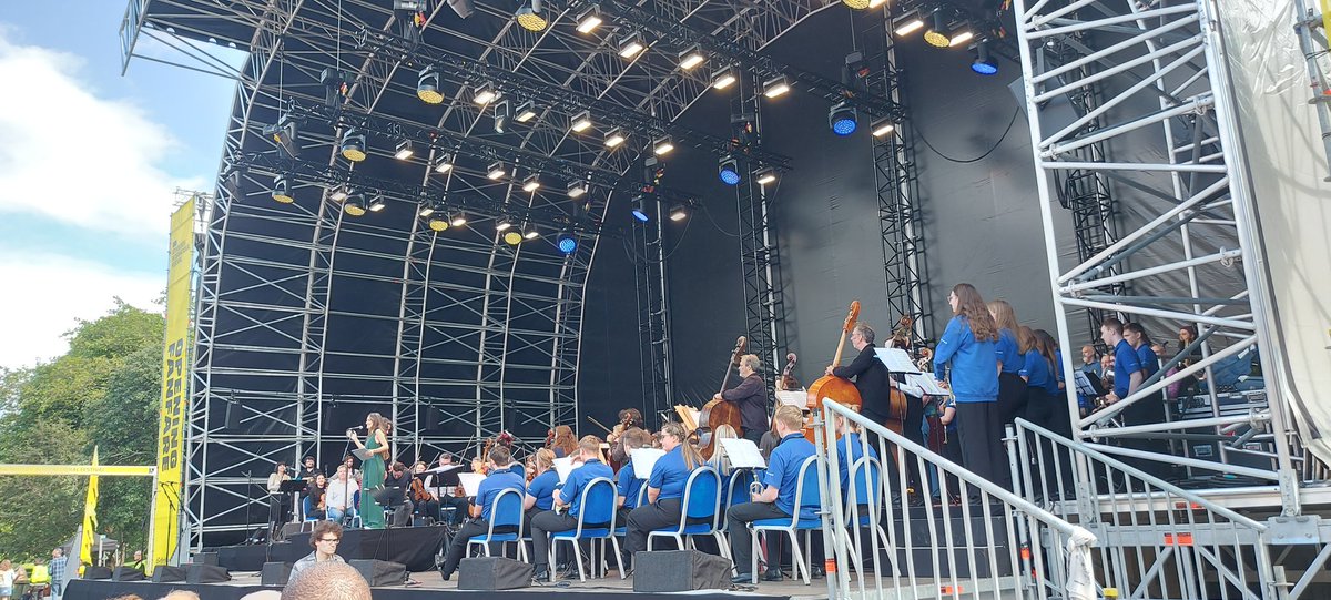 AnnDHenderson's tweet photo. Great performance @GritOrchestra at Opening Fanfare @edintfest in Princes Street Gardens. Good to see Ross Bandstand in use for public benefit. And played out on a lovely tribute to #RabNoakes @WeAreTheMU #EdIntFest23 https://t.co/gZuE3eFkFg