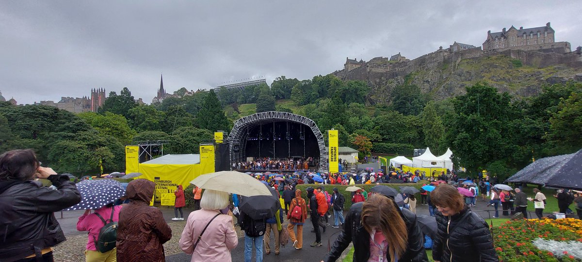 AnnDHenderson's tweet photo. Great performance @GritOrchestra at Opening Fanfare @edintfest in Princes Street Gardens. Good to see Ross Bandstand in use for public benefit. And played out on a lovely tribute to #RabNoakes @WeAreTheMU #EdIntFest23 https://t.co/gZuE3eFkFg