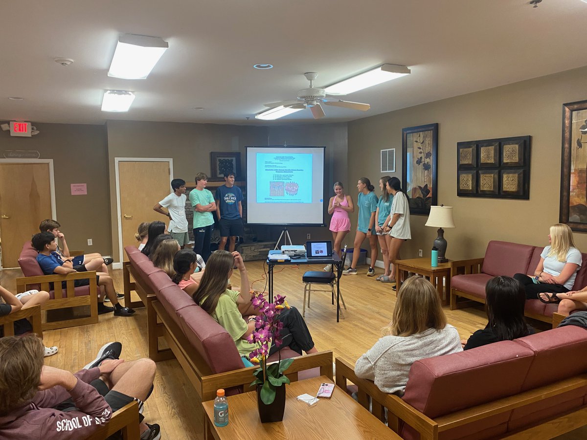 Scenes from Team Camp: Captains explaining our team objectives, and a college-bound program legend shares her wisdom.