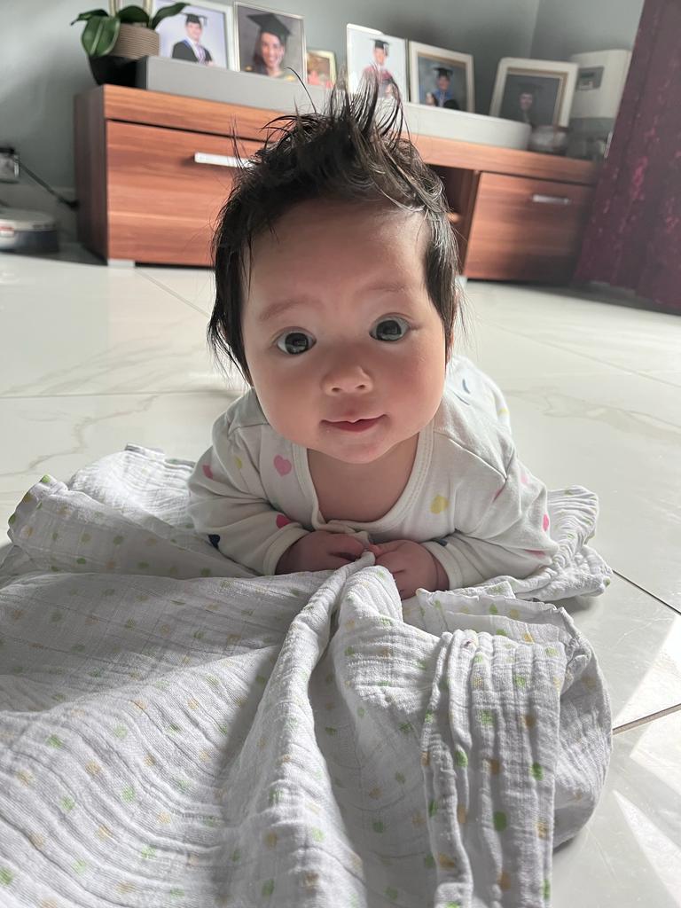 A baby who has dialled cute all the way up to 11