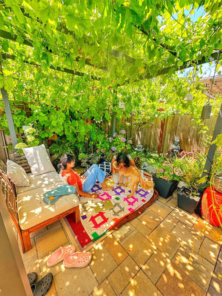 Hot day. Set myself up for some reading under the vine. Went away to turn on the dishwasher, came back to Yoshi taking over. Ok. Then, went away again to switch the laundry load, came back to kids taking over! Got it! I shall take my book and leave.
