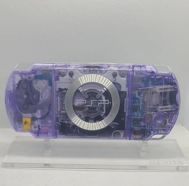 designdocument's tweet photo. Lila &amp; Turquoise Crystal Clear Sony PSP (2000s) 🩵💜 https://t.co/l4WGiQLOJU