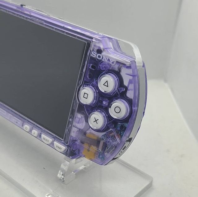 designdocument's tweet photo. Lila &amp; Turquoise Crystal Clear Sony PSP (2000s) 🩵💜 https://t.co/l4WGiQLOJU