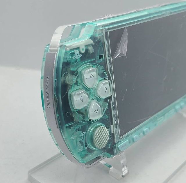 designdocument's tweet photo. Lila &amp; Turquoise Crystal Clear Sony PSP (2000s) 🩵💜 https://t.co/l4WGiQLOJU