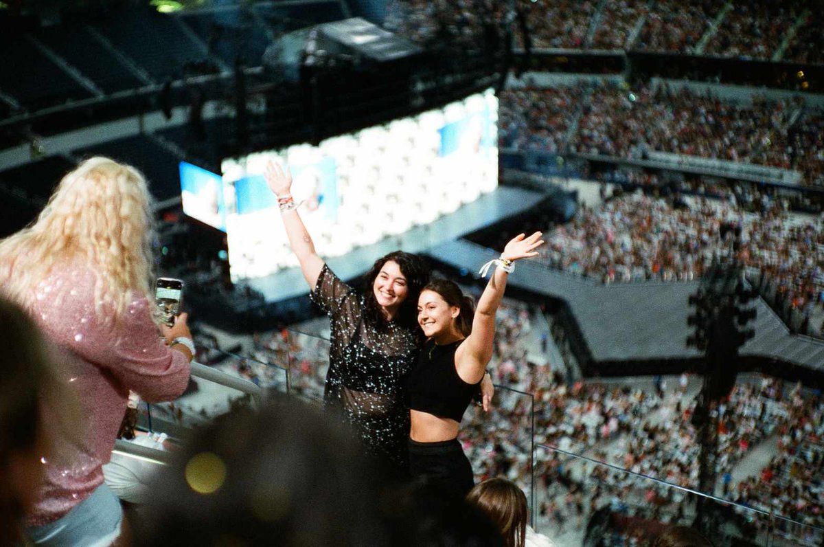 Posting this on twitter because maybe they might see it! My husband did some film photography during N1 of the Eras tour Los Angeles. He got this really cute pic. So if you're sitting in section 419/420 or know these swifties pls send it to them! #TSTheErasTourLA