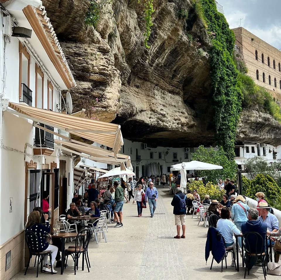 This is Setenil de las Bodegas, a small Spanish town built into the cliffs of a narrow river valley.

Architecture is always cooler when shaped by the local environment.

So, from cities in lakes to villages on volcanoes, here's how to make the world a more interesting place...