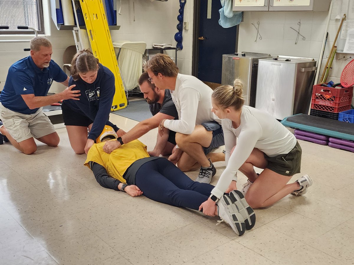 MissyFraserATC's tweet photo. Another big day for the @AugustanaATs Level 2 &amp; 3 MSAT students! Today the students helping with #football (FB) Fall camp met with the clinical staff to go over emergency #spineboarding &amp; #splinting procedures, #taping, &amp; #concussiontesting.
#clinicalexperience   #AT4ALL https://t.co/b8vGkMWPvr
