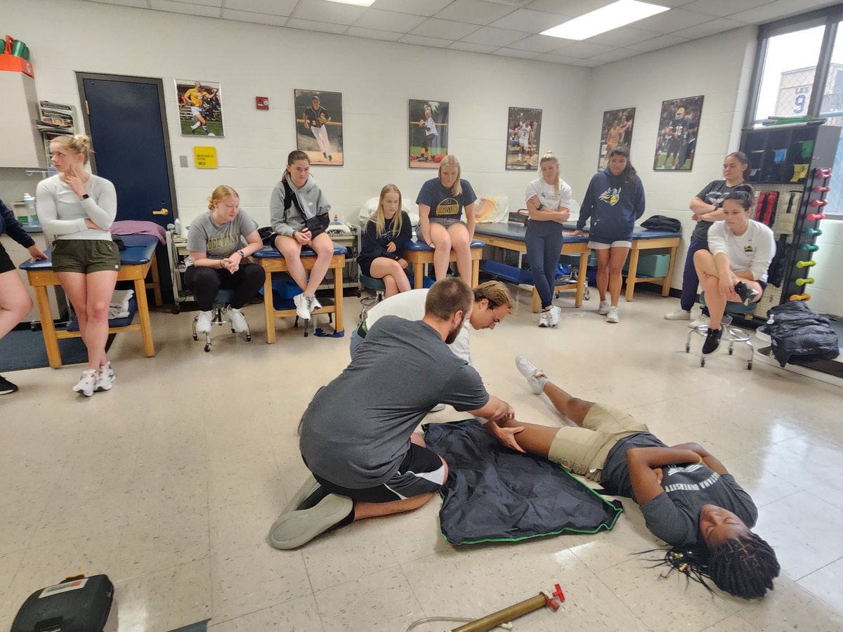 MissyFraserATC's tweet photo. Another big day for the @AugustanaATs Level 2 &amp; 3 MSAT students! Today the students helping with #football (FB) Fall camp met with the clinical staff to go over emergency #spineboarding &amp; #splinting procedures, #taping, &amp; #concussiontesting.
#clinicalexperience   #AT4ALL https://t.co/b8vGkMWPvr