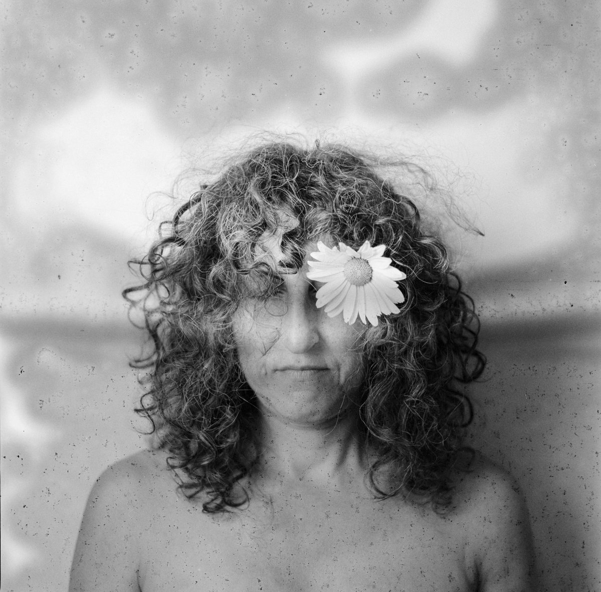 Flower Girl - long expired Kodak film - 1960's Hasselblad 500c - the moisture damage and age of the film itself caused this effect which I rather like #hasselblad500 #expiredfilm #filmsnotdead #analoguephotography #filmphotography #mediumformat