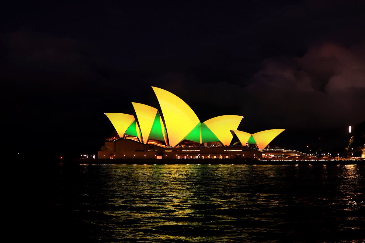 FIFAcom's tweet photo. Australia coming together in support of @TheMatildas 🇦🇺

The Sydney Opera House has been lit up in green and gold to show the country is fully behind their team at this #FIFAWWC https://t.co/hVxeebn5pS