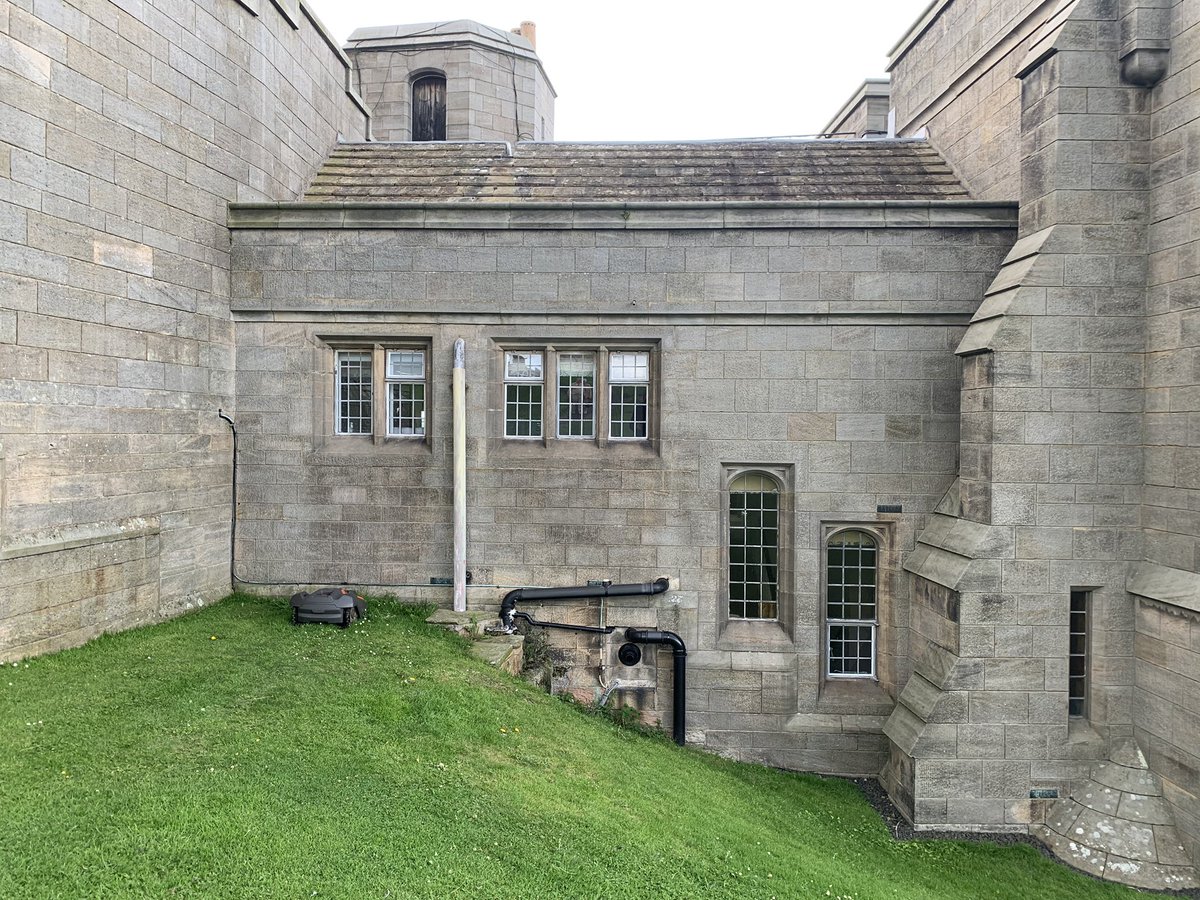Windows, plumbing and a sleeping lawnmower. #Bamburgh