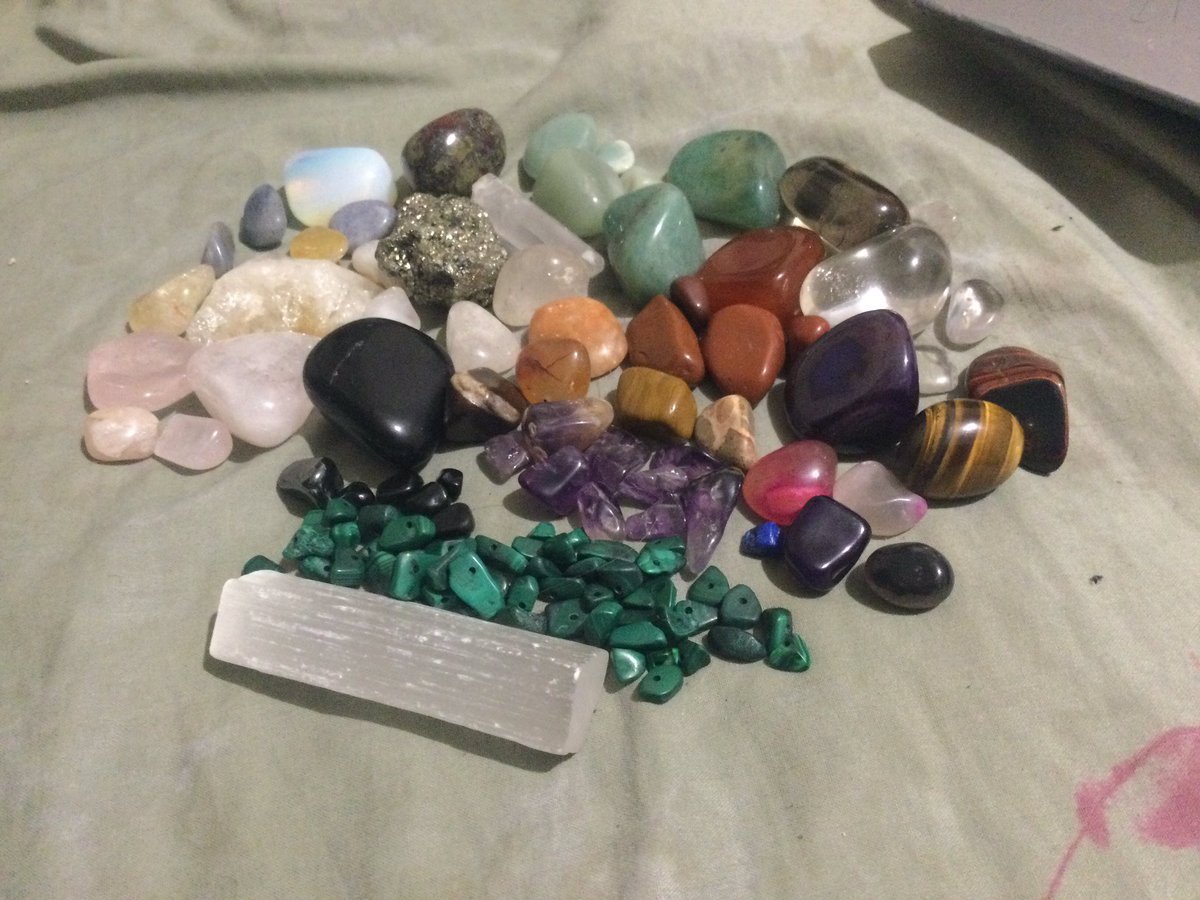 lucidoxide's tweet photo. My current crystal collection. It makes me very happy!! (I’ve included my runes because they’re crystal runes) #crystals https://t.co/xH2PvzpkKp