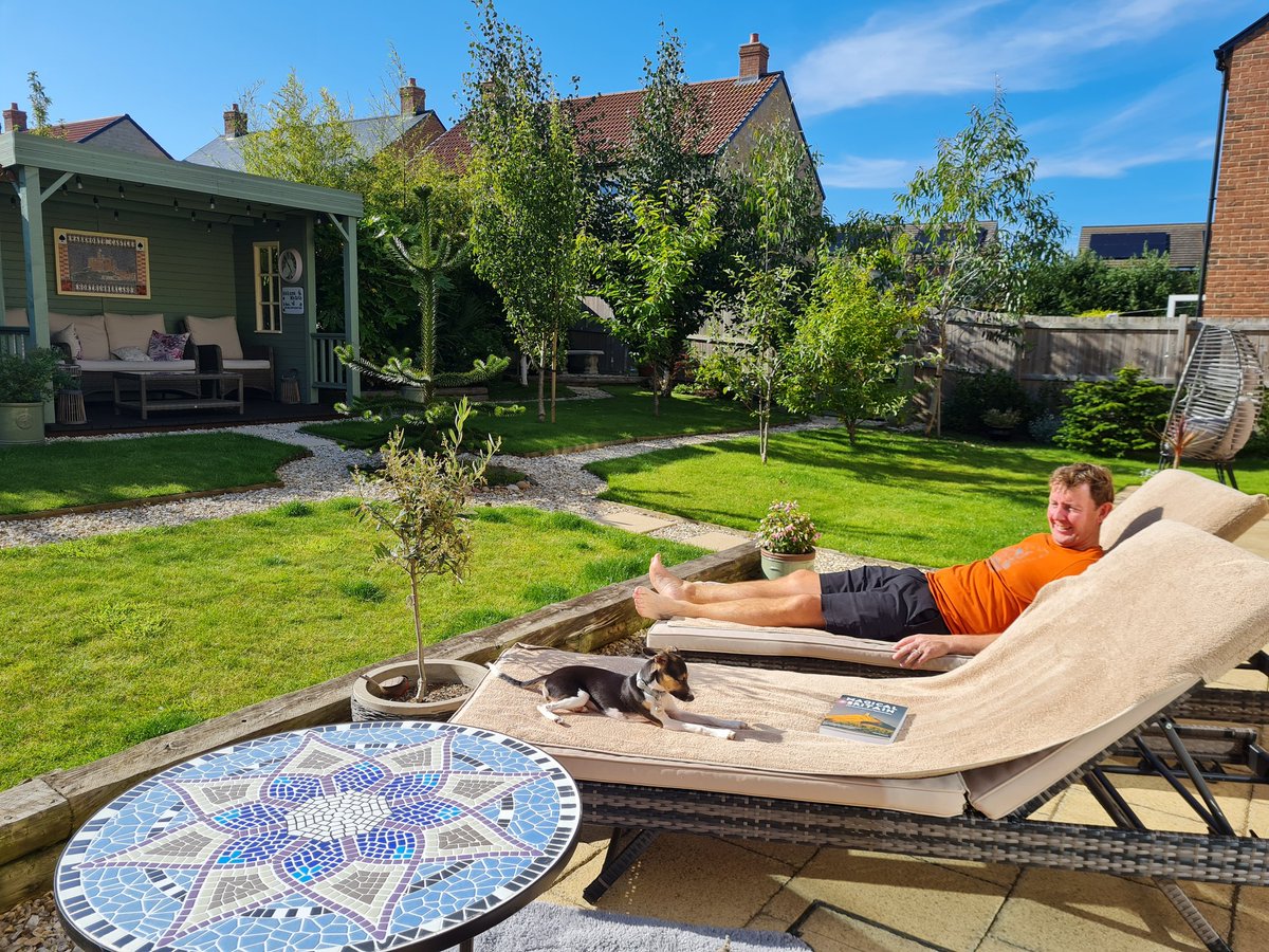 andisheffer's tweet photo. Restful time spent in the garden #sundayvibes #chilledoutpuppy https://t.co/CxJF5jc3DZ