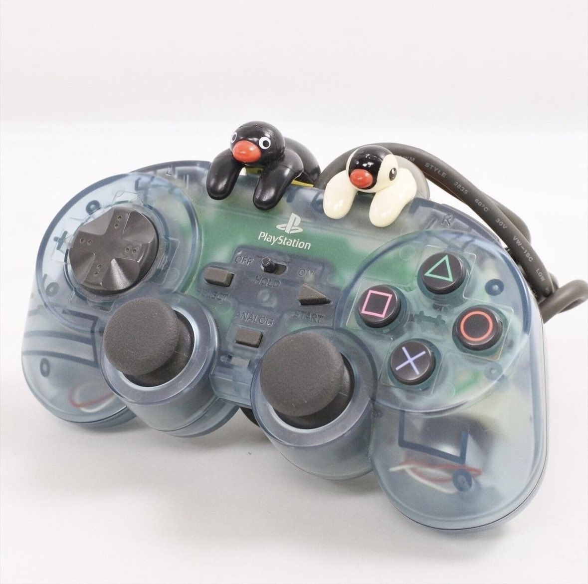 designdocument's tweet photo. Exclusive Pingu PS1 Controller (1999) 🐧 https://t.co/y1GfYGr1oK