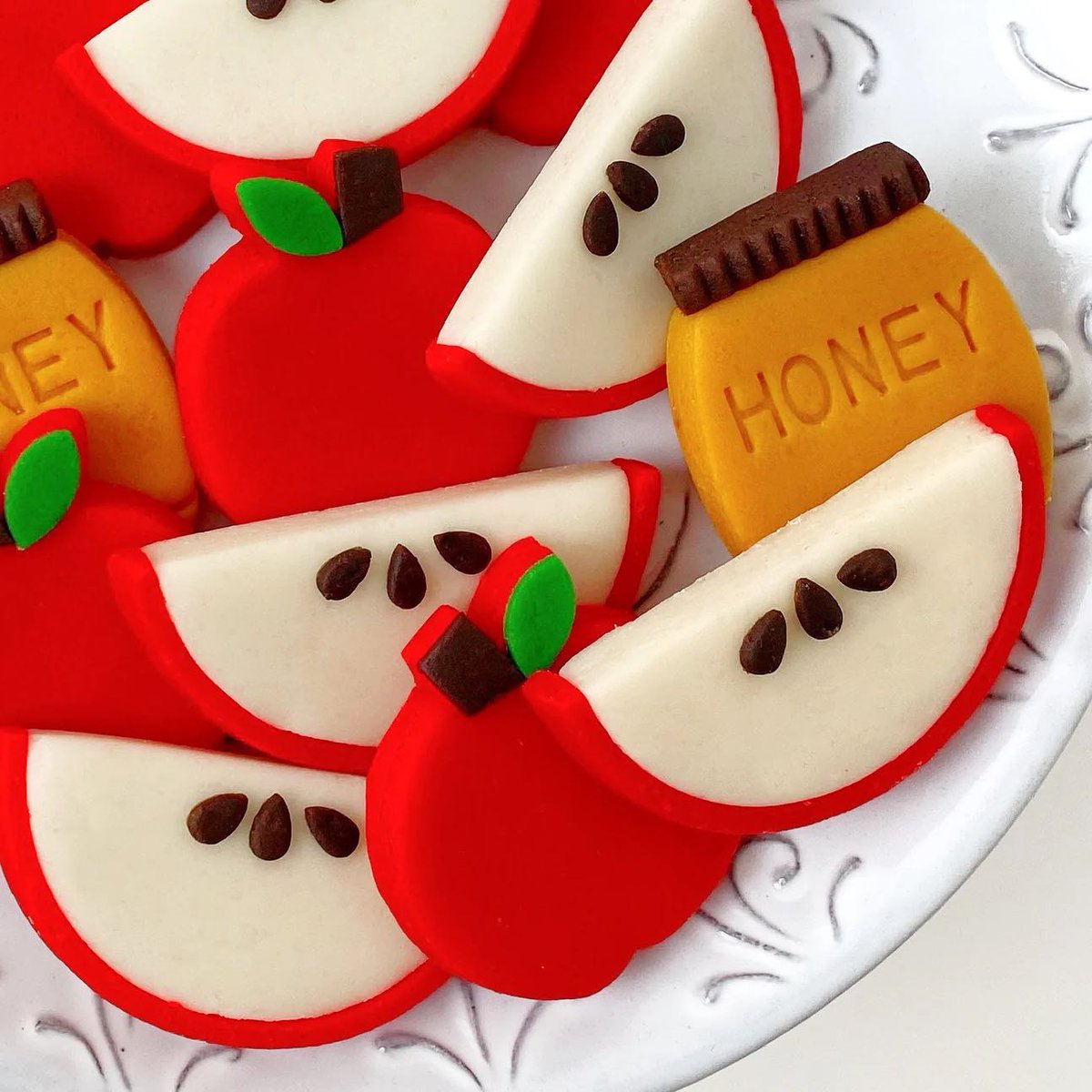 marzipops's tweet photo. Is it time to start planning for Rosh Hashanah? We have so many new and classic treats, like this stunning collection of red apples, apple slices and jars of honey. Add some delicious marzipan to your holida... https://t.co/QWcD0cG2n8