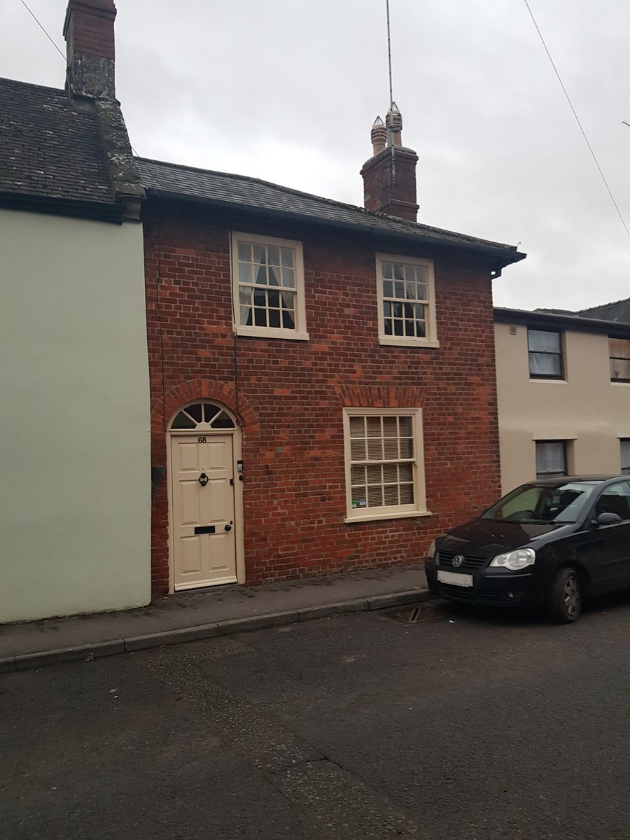 TheHistoryMouse's tweet photo. Charming little terrace in #Codford #Wiltshire. Red brick under slate. #HouseWithTinyCarInfrontForScale https://t.co/LFuxuHKMzW