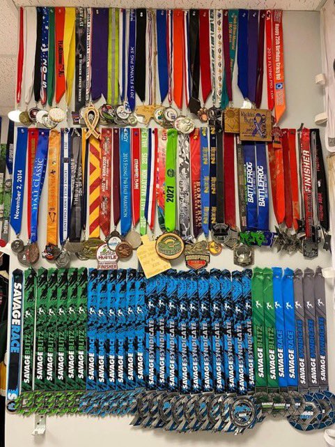 UM4Lyfe's tweet photo. I’m running out of room on my wall. #MysticJay only knows dubs. I don’t take participation metals. If I don’t win or a podium, I throw them in the trash I won’t even take it, but this is why I am the OCR guy for the org. #StayMistic https://t.co/tXsIYecl0v