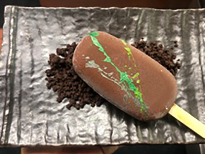 This refreshing dessert is made by infusing mint from our Chef’s Garden in a dark chocolate Valrhona pudding. The bar is garnished with gluten-free chocolate cookie crumble. This delicious treat can be enjoyed on our in-room dining and poolside menus.