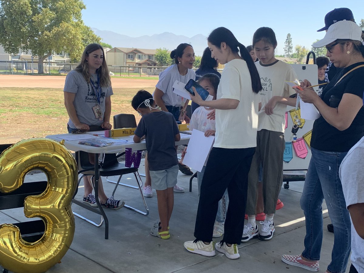 Caregivers and students gather around to meet their upcoming teachers <a href="/RascalPride/">Rowland Elementary</a>  #CareandConnect event before the 2023-2024 school year begins.