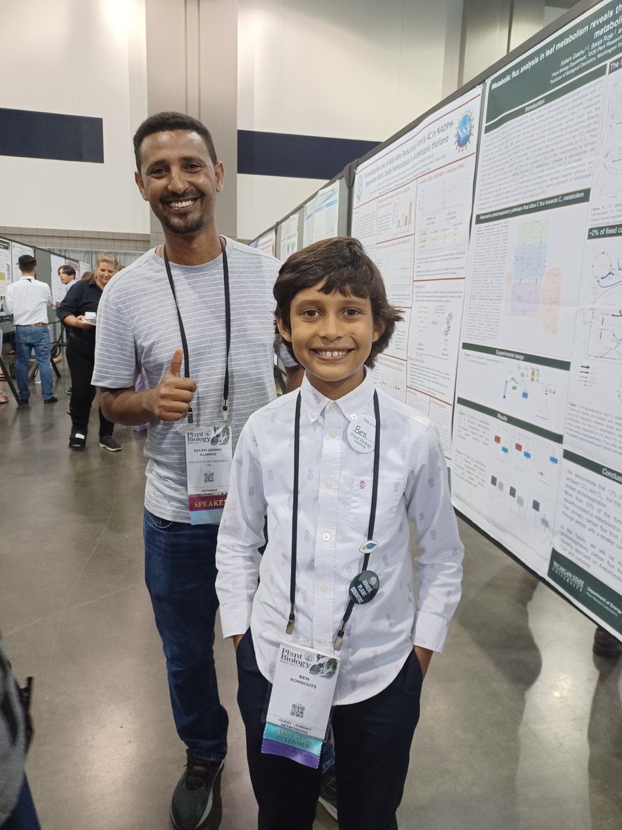 ASPB's tweet photo. 8-year-old Ben heard #PlantBio2023 was coming to town and just had to be part of it! Total focus as @GashuKelem walked him through his poster #futurescientist https://t.co/sVAHs8AeJz