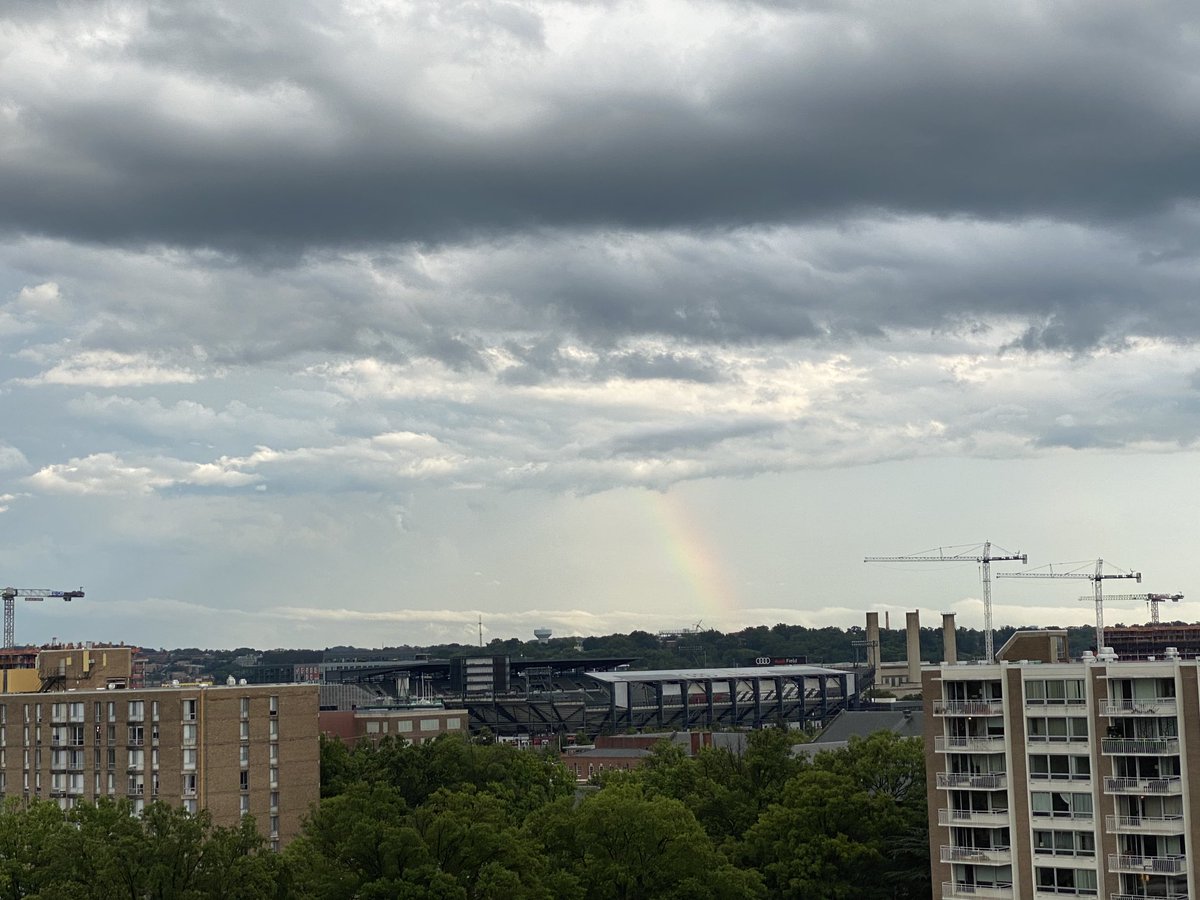 CKain's tweet photo. The start of a rainbow now visible from SW DC https://t.co/BviWbnmti5