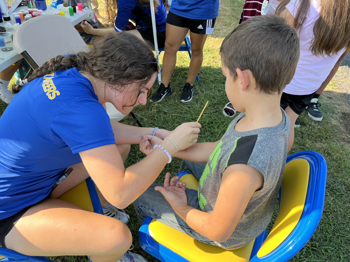 eosc_wsoc's tweet photo. The Eastern Soccer ladies spent some time giving back to the community at the Back to School Bash this evening with face painting and handing out school supplies! #TheE https://t.co/R2PzSO9gYc