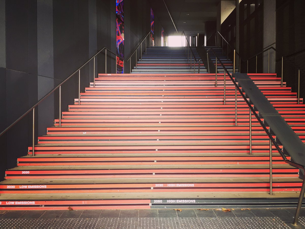 windjunky's tweet photo. A stairway climate stripes on my walk to #climateadaptation2023 - includes projections! Almost can’t see the blue steps at the top… 😢 @ed_hawkins https://t.co/GdWTT3U2Xt