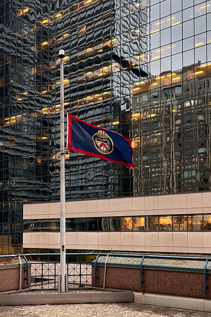 A view of our flag at HQ tonight lowered in honour of police dog Bingo who sacrificed his life in service of public safety. Flags have been lowered at Service facilities across the city ^km