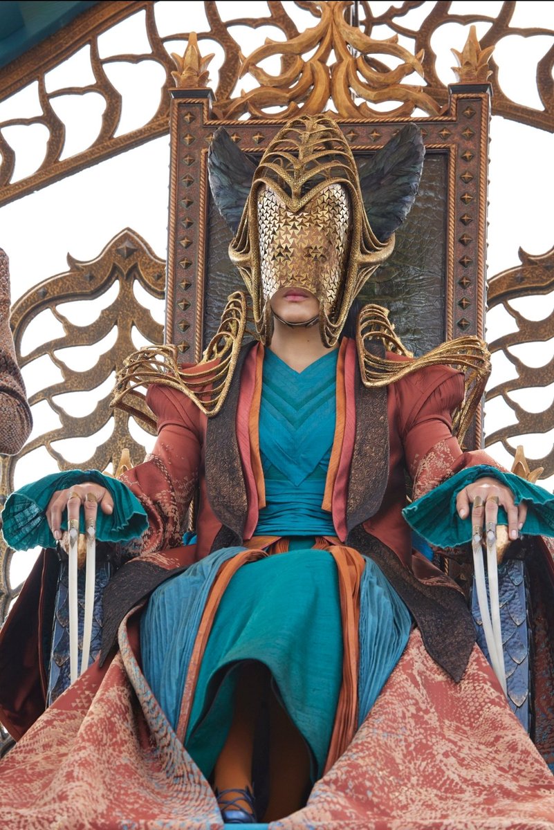timmyhass's tweet photo. @thedustywheel No idea whether this has already been talked about (I'm behind on the live shows and theories) but if we still think that's a person in front of the wheel, could it be Lady Suroth with her headress but mask removed? https://t.co/QUcg9gzMJv