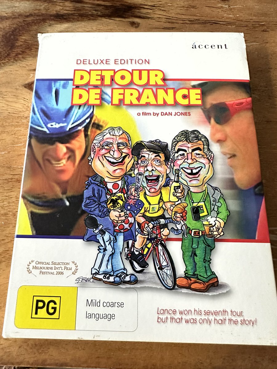 GaiWilson's tweet photo. @ozDanJones I’m staying in a hotel and browsed the dvds whilst waiting for the lift and what should I find? Detour de France!  Been wanting to watch it for ages. Asked at the desk if I could borrow it. ‘You can have that’! was the reply! 😂😂😂 https://t.co/7vKxMQ4BBV